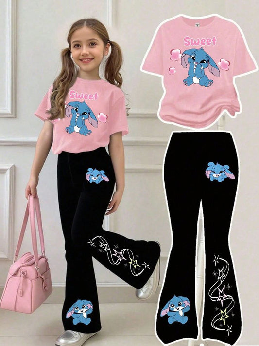 A pink, short-sleeve t-shirt with a  character graphic and Sweet black pant